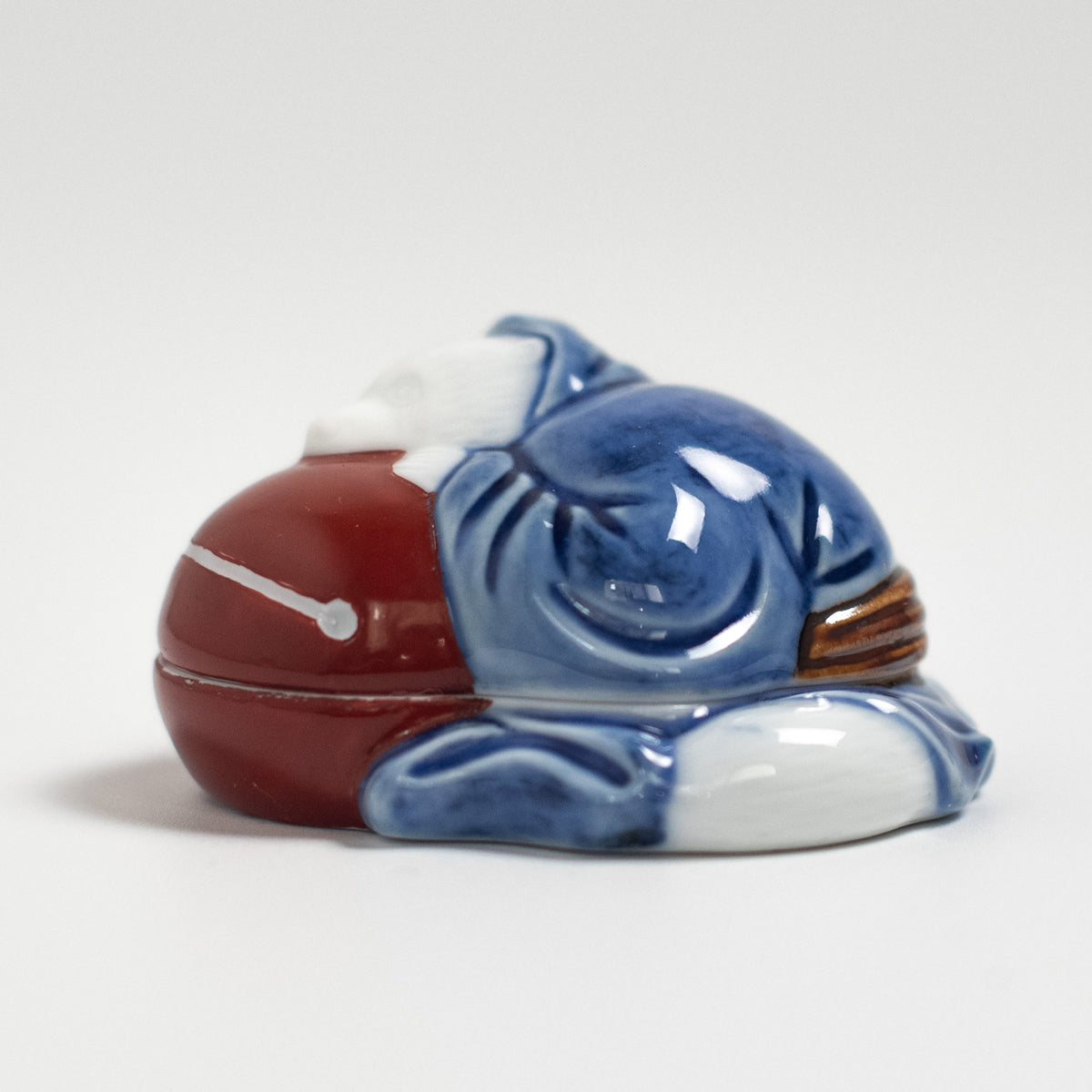 Arita Ware: Tanuki-Shaped Incense Container with Blue-and-White Decoration and Overglaze Enamel
